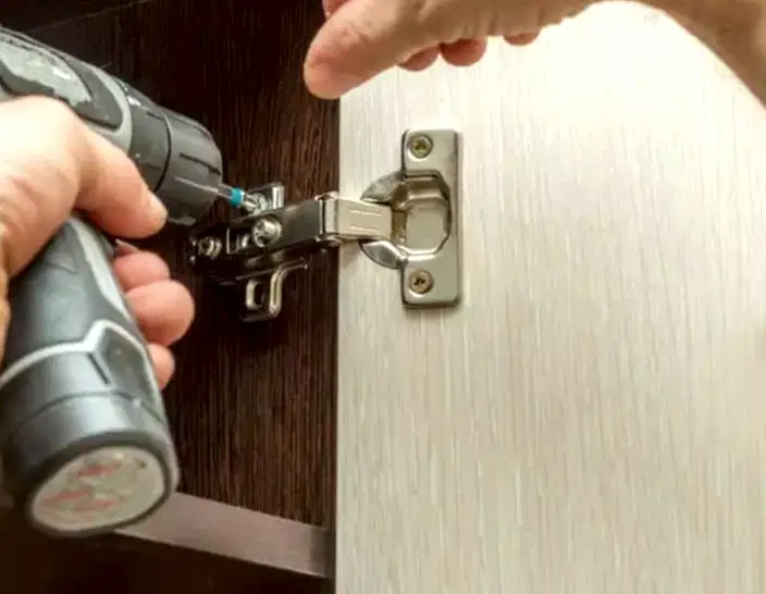 Kitchen Door 33 Attach the hinges to the cabinet door frame