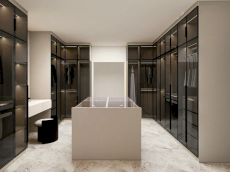 Custom Wholesale Cabinets 33 A luxurious walk-in closet designed for modern wardrobe needs.