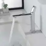 Sanitary Ware 15 Sleek chrome bathroom faucet with modern design flowing water into a white sink